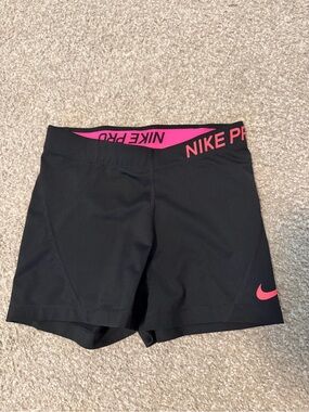 Nike Women's Black Athletic Shorts with Pink Accents